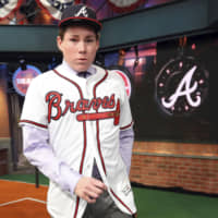 Carter Stewart wears a Braves uniform after being selected in the eighth round of the 2018 MLB Draft last October in Secaucus, New Jersey.