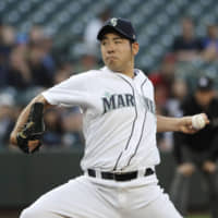 Seattle starter Yusei Kikuchi pitches against the Los Angeles Angels in the first inning on Thursday night.