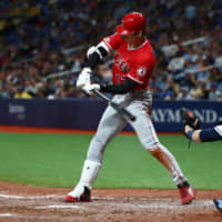 Los Angeles Angels designated hitter Shohei Ohtani singles during the seventh inning against Tampa Bay to complete the cycle.