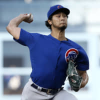 Cubs starter Yu Darvish pitches against the Dodgers on Saturday at Dodger Stadium in Los Angeles. Darvish struck out 10 in the Cubs' 2-1 victory over his former team.