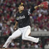 Hawks hurler Kodai Senga fires a pitch in Friday's game against the Carp at Mazda Stadium. Fukuoka SoftBank defeated Hiroshima 6-3.