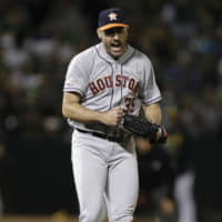 Houston starter Justin Verlander reacts in the eighth inning against Oakland on Saturday night.