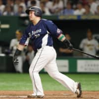 Pacific League slugger Hotaka Yamakawa, who normally plays for the Seibu Lions, belts a solo homer in the sixth inning in Game 1 of the NPB All-Star Series on Friday night at Tokyo Dome. The PL defeated the Central League 6-3.
