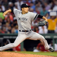 Yankees starter Masahiro Tanaka pitches against the Red Sox in the second inning on Thursday night.