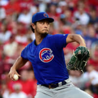 Cubs starter Yu Darvish pitches against the Cardinals during the first inning at Busch Stadium in St. Louis. Darvish and Chicago lost 2-1.
