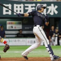 The Buffaloes' Steven Moya hits an RBI double against the Hawks during the seventh inning on Wednesday at Yafuoku Dome.