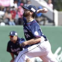 The Lions' Zach Neal pitches against the Fighters on Tuesday at Kushiro Stadium. Seibu routed Hokkaido Nippon Ham 8-2.