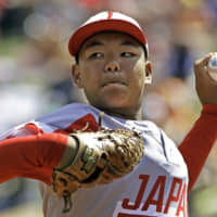 Japan's Taishi Kawaguchi pitches against Curacao during the second inning of their game in the Little League World Series on Saturday in South Williamsport, Pennsylvania.
