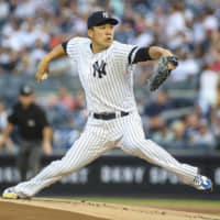 New York starter Masahiro Tanaka pitches against Cleveland in the first inning on Friday night. USA TODAY / VIA REUTERS