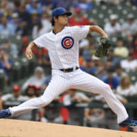 Cubs starter Yu Darvish pitches against the Cardinals on Sunday in Chicago.