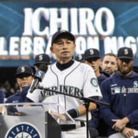 Former Seattle Mariners player Ichiro Suzuki pauses while giving a speech during a ceremony in which he was given Mariners' Franchise Achievement Award on Saturday in Seattle.