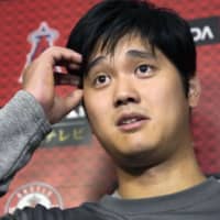 Shohei Ohtani speaks to the media on Tuesday in Anaheim, California.