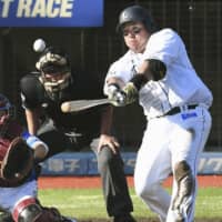 The Lions' Hotaka Yamakawa connects on a tiebreaking double in the eighth inning against the Eagles on Sunday.