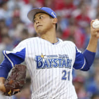 BayStars left-hander Shota Imanaga pitches against the Carp on Aug. 18 in Yokohama.