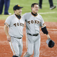 Giants catcher Shinnosuke Abe (left) has played an integral part in the team's success during manager Tatsunori Hara's three stints in charge of the team.