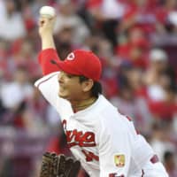Carp starter Daichi Osera pitches against the Dragons on Tuesday at Mazda Stadium. Osera led Hiroshima to a 3-0 victory over Chunichi.