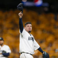 Seattle's Felix Hernandez salutes fans after being relieved in the fifth inning against the Athletics at T-Mobile Park on Thursday.