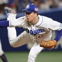 Dragons hurler Yuya Yanagi pitches against the BayStars on Saturday at Nagoya Dome. Chunichi routed Yokohama 8-3.