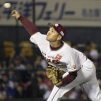 Eagles hurler Takahiro Norimoto pitches against the Lions on Thursday in Sendai. Tohoku Rakuten hammered Seibu 7-1 in the teams' regular-season finale.