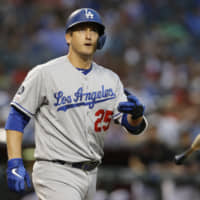 The Dodgers' David Freese, seen tossing his bat on June 3, announced his retirement on Saturday.