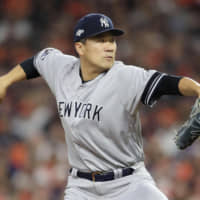 Yankees hurler Masahiro Tanaka pitches in Game 1 of the ALCS against the Astros on Saturday in Houston.