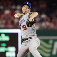 Dodgers reliever Kenta Maeda pitches against the Nationals on Sunday.