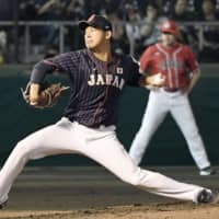 Japan southpaw starter Shota Imanaga pitches against Canada in an exhibition game on Friday night at Okinawa Cellular Field. Japan defeated Canada 3-0.