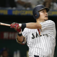 Yoshitomo Tsutsugo, seen playing for Japan during the 2017 World Baseball Classic, is one of four NPB stars looking for a home in the majors this offseason.