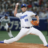 Daisuke Matsuzaka, seen pitching for the Dragons in 2018, will return to the Lions for the 2020 season.