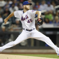 Zack Wheeler, seen pitching for the New York Mets in September, is on the verge of joining the Philadelphia Phillies on a five-year deal, according to sources.