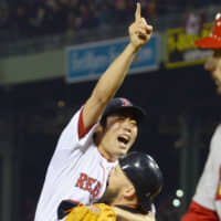 Red Sox reliever Koji Uehara celebrates after recording the final out against the Cardinals in Game 6 of the 2013 World Series, which clinched the title for Boston.