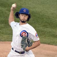The Cubs' Yu Darvish pitches against the Cardinals on Aug. 18 in Chicago. | AP