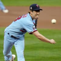 Twins pitcher Kenta Maeda throws to a Tigers batter on Wednesday in Minneapolis. | AP