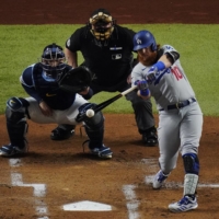 Justin Turner homers for the Dodgers in Game 3 of the World Series on Friday in Arlington, Texas. | AP