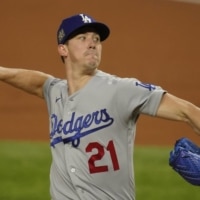 Dodgers starter Walker Buehler pitches against the Rays in Game 3 of the World Series on Friday in Arlington, Texas. | AP