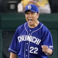 Dragons pitcher Yudai Ono reacts during his start against the Tigers in Nishinomiya, Hyogo Prefecture, on Sept. 30. | KYODO