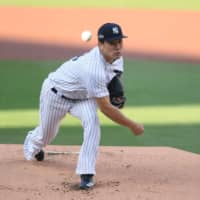 Yankees starter Masahiro Tanaka pitches against the Rays during Game 3 of the ALDS on Tuesday in San Diego. | USA TODAY / VIA REUTERS