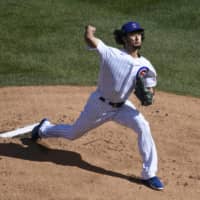 Chicago's Yu Darvish pitches against the Marlins during Game 2 of their wild-card series on Friday in Chicago. | USA TODAY / VIA REUTERS