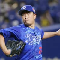 Dragons starter Yudai Ono pitches against the Tigers on Wednesday at Nagoya Dome. | KYODO