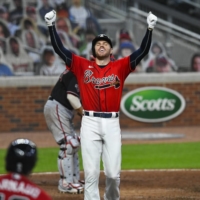 Atlanta's Freddie Freeman was named the National League's Most Valuable Player, becoming the sixth player in Braves franchise history to receive the honor. | AP