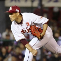 The Eagles' Yuya Kubo pitches against the Swallows during an interleague game on June 12 in Sendai. | KYODO 