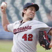 Twins starter Kenta Maeda throws against the Tigers on Aug. 30 in Detroit. Maeda has been nominated for the AL Cy Young Award after going 6-1 in 11 starts. | USA TODAY / VIA REUTERS