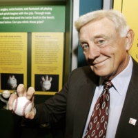 Phil Niekro displays a knuckleball grip at the Great Lakes Science Center in Cleveland on March 29, 2007. | AP