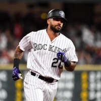 The Rockies' Ian Desmond rounds the bases after a home run against the Cardinals at Coors Field in Denver on Sept. 11, 2019. | USA TODAY / VIA REUTERS