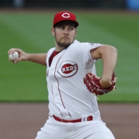 Reds starter Trevor Bauer pitches against the Brewers in Cincinnati on Sept. 23, 2020. Bauer, a free agent, revealed on Friday that he was signing with the Dodgers. | USA TODAY / VIA REUTERS