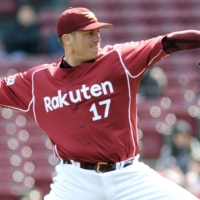 Eagles pitcher Darrell Rasner delivers during a game against the Carp on March 8, 2011. | KYODO