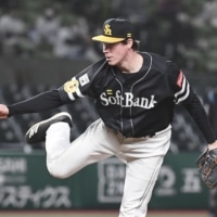 Hawks reliever Carter Stewart Jr. pitches against the Lions on Saturday at MetLife Dome in Tokorozawa, Saitama Prefecture. | KYODO
