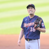 Twins starting pitcher Kenta Maeda reacts after giving up a home run in the first inning against the Indians on Tuesday in Cleveland. | USA TODAY / VIA REUTERS