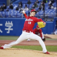 Carp starter Masato Morishita pitches against the Swallows on Tuesday at Jingu Stadium. | KYODO