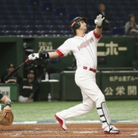 Mexico's Matt Clark hits a home run against Australia at Tokyo Dome during a Premier12 game on Nov. 12, 2019. | KYODO 